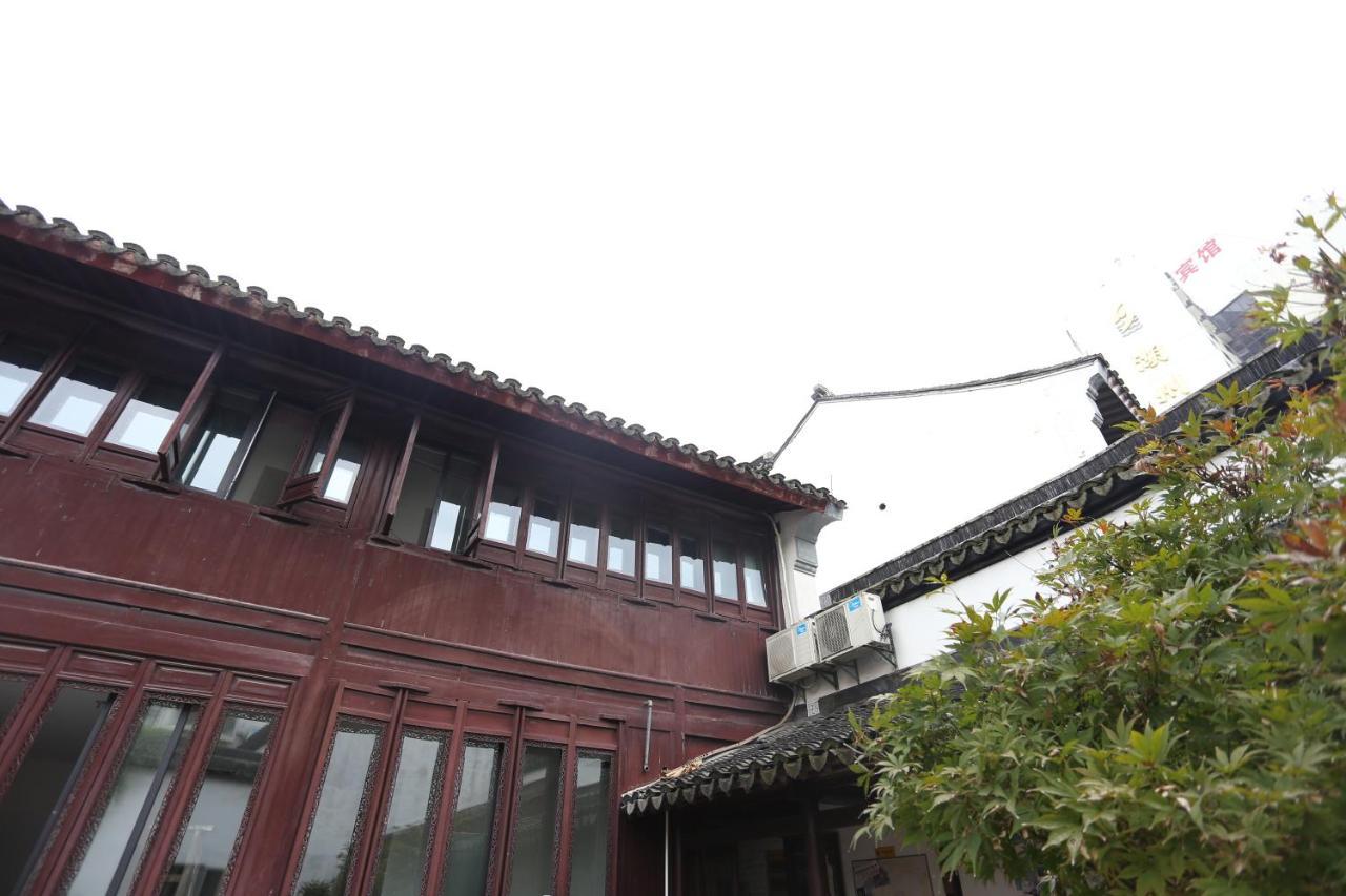 Snail Youth Hostel Huzhou Exterior foto